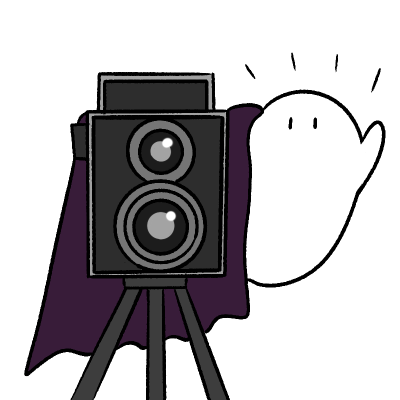 写真を撮ろうとするおばけ